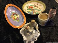 Photo showing five vintage Japanese and oriental porcelain and ceramic items including plates, jar, and figurines