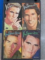 Four Interview Magazine issues laid flat featuring Arnold Schwarzenegger, Richard Gere, Matt Dillon and one unidentified portrait cover