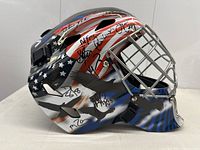 Right side profile showing American flag paint, bald eagle graphic and multiple black ink signatures