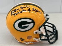 Right side view of yellow helmet with Green Bay Packers logo and Reggie White signature with inscription