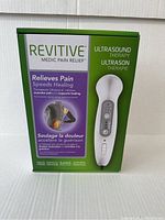 Front view of the Revitive Ultrasound Therapy wand box showing branding, product image, and benefits.