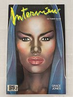 Front cover of October 1984 Interview Magazine featuring Grace Jones with painted close-up portrait and title