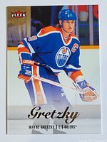 Front of 2013 Fleer Ultra Showcase Wayne Gretzky hockey card showing player image in Oilers uniform