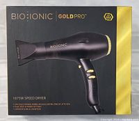 Front view of the retail box showing the hair dryer image, model name and features.