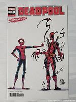 Front cover of the comic book showing Deadpool and Spider-Man cartoon characters with 'Carnage' variant label.