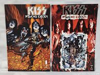 Two KISS Psycho Circus comic books side by side showing front covers.