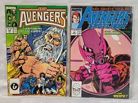 Photo showing two vintage Marvel Avengers comic books: The Avengers #282 and Avengers Spotlight #26, both in protective sleeves.