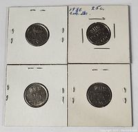 Four Netherlands 25 cent coins dated 1980, displayed in protective cardboard holders.