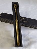 Skull themed ice pick in black box with foam insert showing the packaging and item condition.