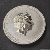 Obverse side of the coin showing Queen Elizabeth II profile, Australian origin, purity of silver, year 2012 and denomination.