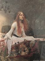 Photo of framed vintage print showing a woman with red hair seated on ornate rug, signature and date visible
