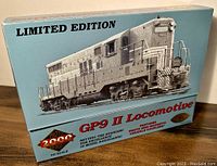 Blue box with image and text indicating limited edition PROTO 2000 GP9 II Locomotive in HO scale.