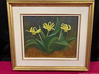 Photo of framed painting showing the overall artwork with gold frame and white matting.