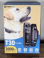 Box front showing Labrador retriever and T30 E-collar remote and collar receiver, 3000 ft wireless range.