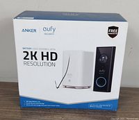 Front of box showing Anker and Eufy branding, image of video doorbell and base station, 2K HD resolution and battery video doorbell text.