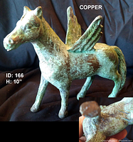 Full view of the copper winged horse sculpture showing size and green patina.