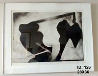 Framed black and white abstract lithograph.
