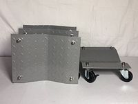 Four gray metal diamond plate vehicle trolleys arranged with one facing up and others stacked.