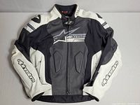 Front view of jacket showing color, graphics and overall condition