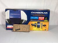 Full boxed Chamberlain smart garage opener kit showing main unit box and myQ control box