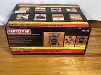 Front of unopened Craftsman table saw box showing branding and product image