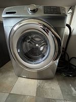 Front view showing control panel, door, overall condition