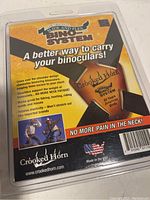 Packaging front displaying product features such as slide and flex system, ergonomic design, and American made label.