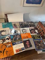Top view of a collection of 15 jazz vinyl LP records showing album covers with various artists and styles.