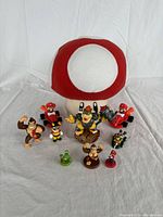 Overall lot showing mushroom plush and character figures arranged in a cluster