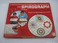 Top view of the vintage Kenner Spirograph box with graphics and text describing the toy's use.