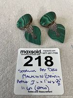 Front view of both earrings showing the green malachite in oval and teardrop shapes set in sterling silver in Art Deco style.