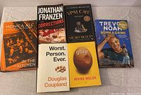 All six books arranged showing their front covers.