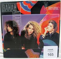Front cover of Bananarama self titled vinyl LP showing band members and colorful artwork, sticker indicating inclusion of limited edition free poster.