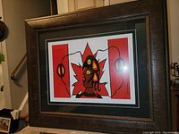 Front view of professionally framed fine art print by Christian Morrisseau titled 'Canada'.