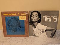 Front covers of the two vinyl records: Roberta Flack's "Oasis" and Diana Ross's self-titled album.