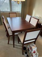 Full view of rectangular dining table with six chairs
