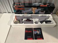 Overview of box, styrofoam insert and all contents laid out