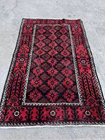 Full view of rug laid flat showing overall pattern and color scheme