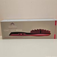Box front view showing Sutra Ionic Heat Brush branding and product image