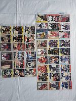 Photo showing 45 hockey cards laid flat in plastic sleeves, featuring various NHL players from 1990-1992 seasons in good condition.