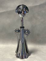 Front view of the chrome plated corkscrew showing face top and closed wings
