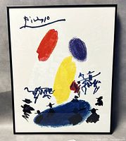 Front view of framed lithograph print showing colorful abstract shapes and black stylized figures with signature.