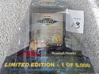Front view of the boxed Matchbox Gold Collection Plymouth Prowler die-cast model. Shows limited edition label 1 of 5000 and certification inside the box.