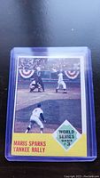 1963 Topps Roger Maris baseball card featuring World Series Game 3 with Maris Sparks Yankee Rally at the bottom.