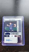 Matt Brash rookie baseball card with autograph, numbered 39/99, in protective plastic casing.