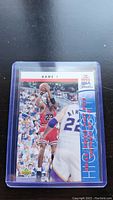 Front image of 1993 NBA Hoops Michael Jordan basketball card showing game action and card details