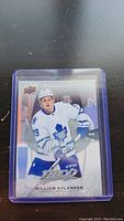 Image of a William Nylander rookie hockey card from Upper Deck MVP series, in a protective plastic sleeve.