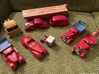 Overview of lot showing all tinplate vehicles and original box