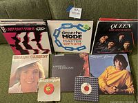 Front grouping of LPs and 45s showing The Beat, Depeche Mode, Queen, Shaun Cassidy, Missing Persons, Scott Baio plus two 45 RPM singles.
