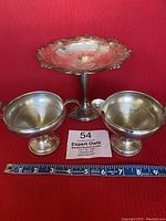 Full view of Chantilly by Gorham silverplate compote with two sterling weighted pedestal pieces: creamer and sugar bowl.